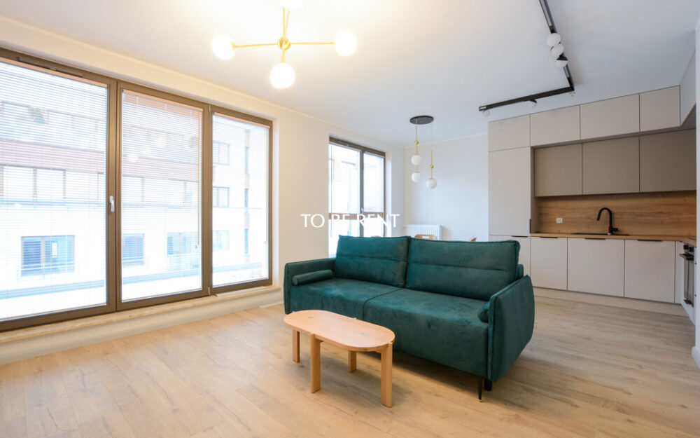 For long-term rent: A luxurious 2-room apartment in a prestigious location with a parking space and a spacious terrace!